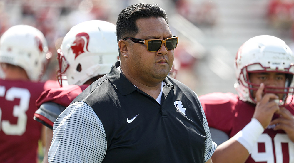 Edwin Mulitalo, without headset, on the Southern Virginia sidelines