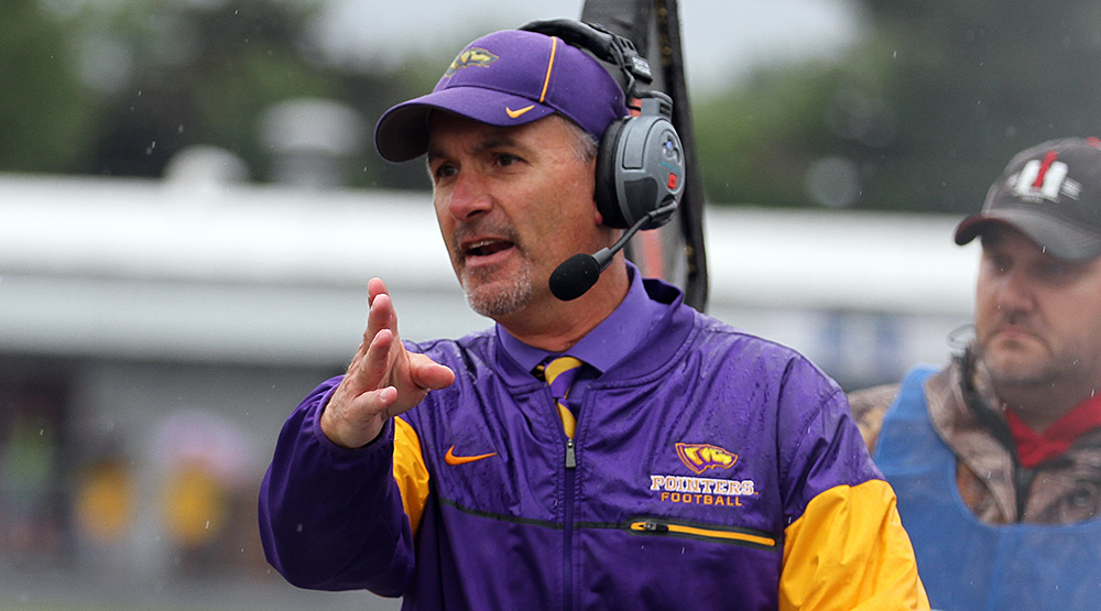 Tom Journell, gesturing on sidelines