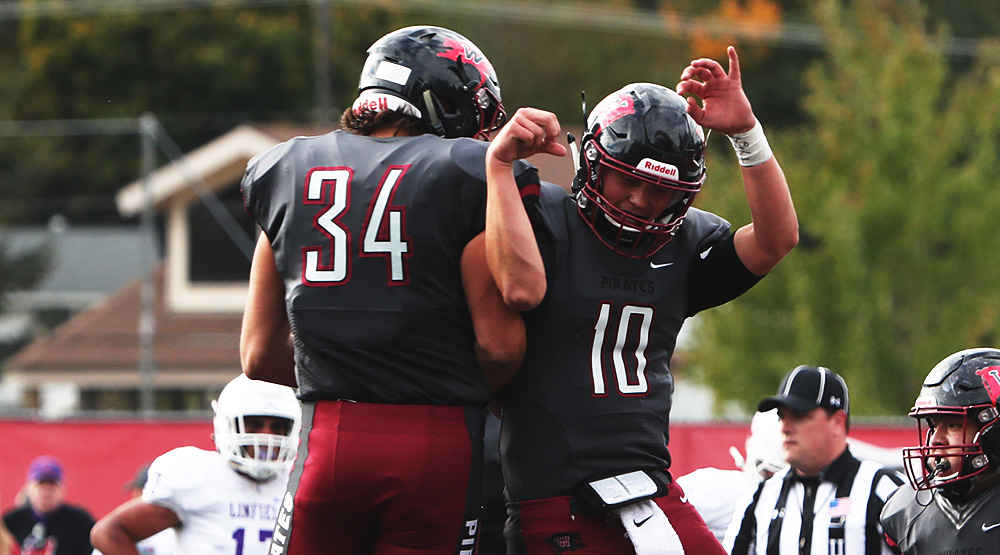 Anthony Ruiz and Leif Ericksen celebrate in the end zone